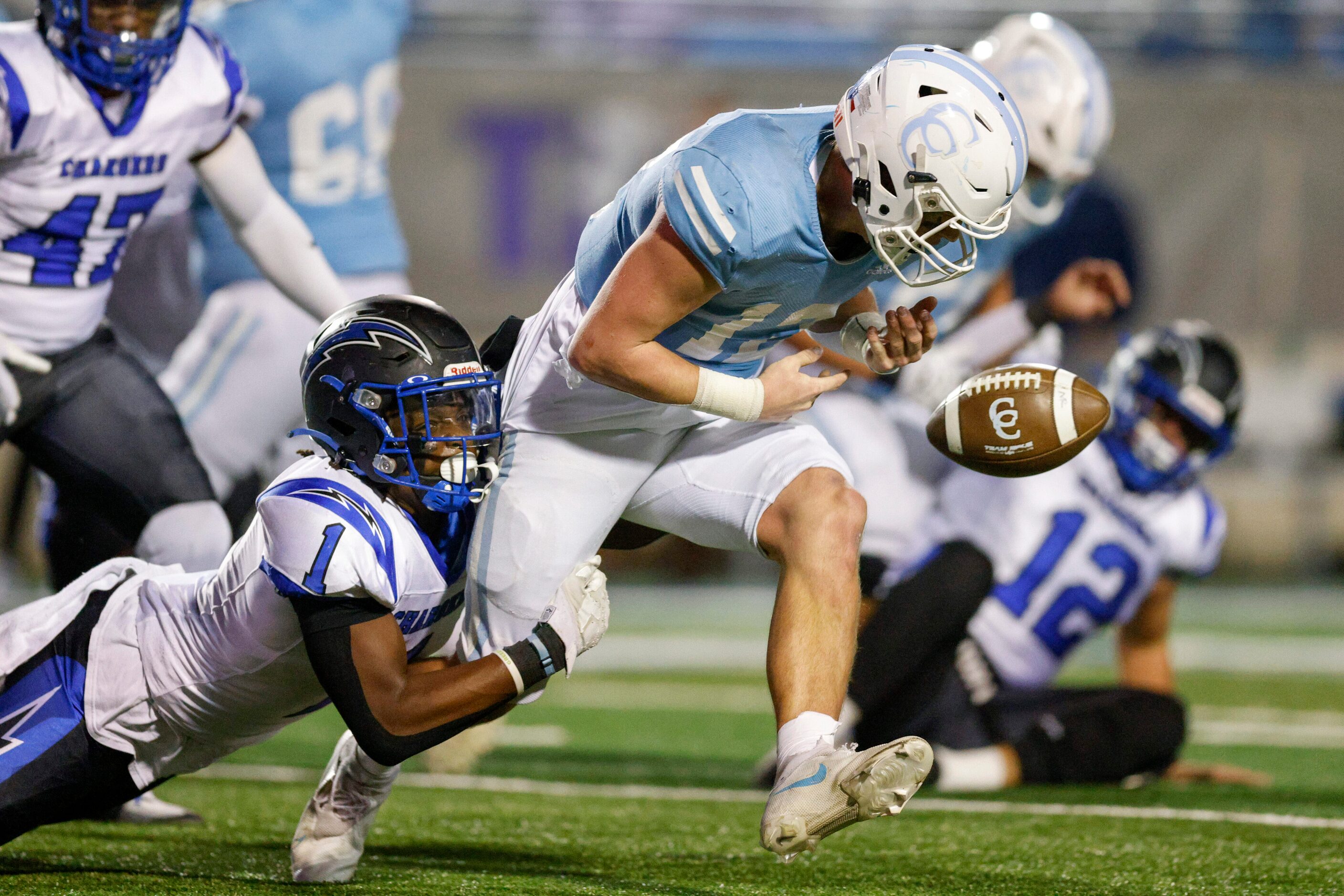 Dallas Christian defensive back Chris Scott (1) forces a fumble from Houston Cypress...