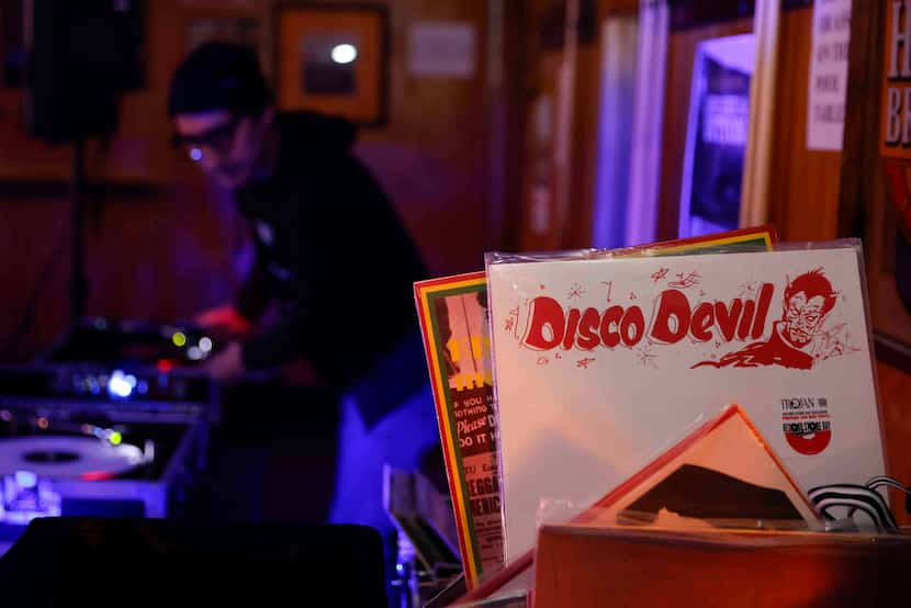 A part of record collection remains as DJ Sam Ramirez plays at Sunshine Club on Friday, Dec....