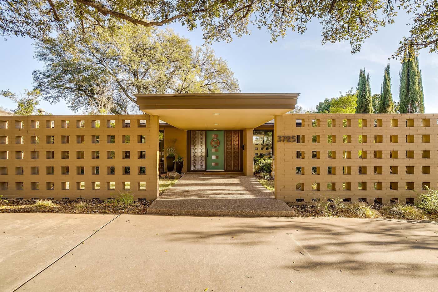 Built in 1957, the midcentury home in Overton Park sits on a sprawling lot with mature trees.