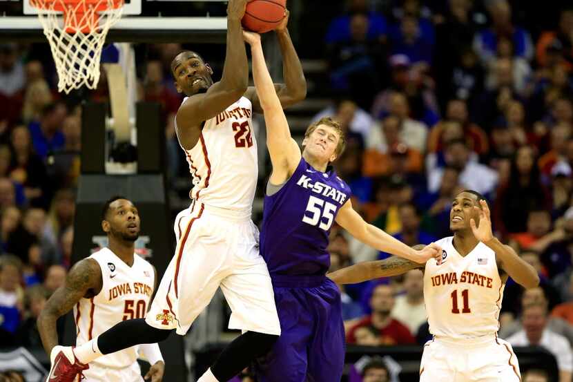 KANSAS CITY, MO - MARCH 13:  Dustin Hogue #22 of the Iowa State Cyclones battles Will...