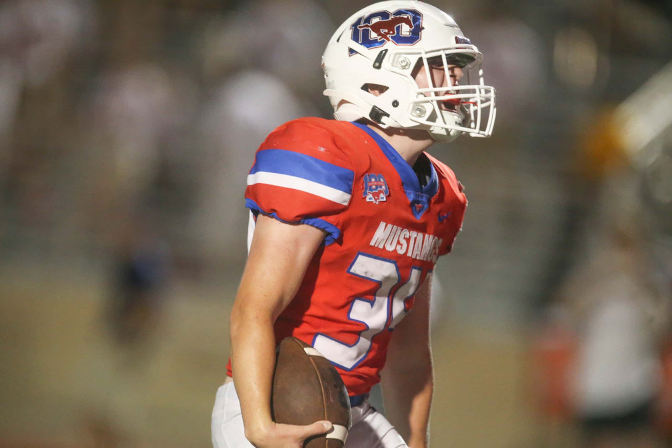 Grapevine running back Eliot Hanson (34) celebrates his touchdown during the second half of...