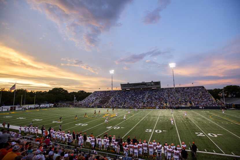 Highland Park kicks off to Rockwall during the first half of a high school football game at...