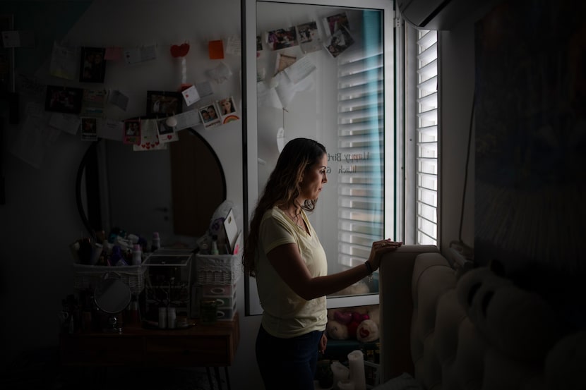 Lilach Almog, who lives across from the police station that was destroyed during the attack,...