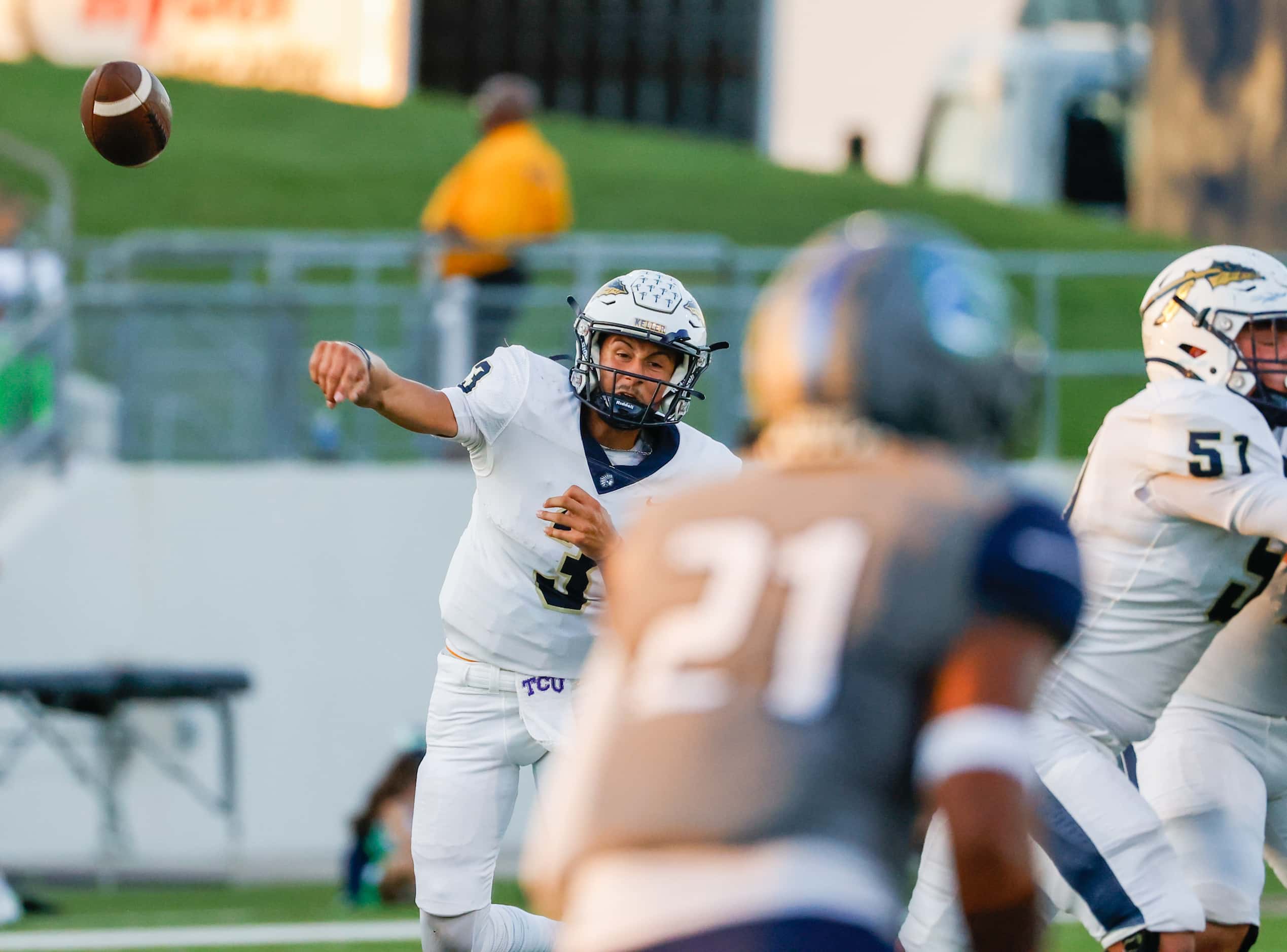 Keller High School quarterback Tre Guerra (3) releases a pass that is intercepted by V.R....