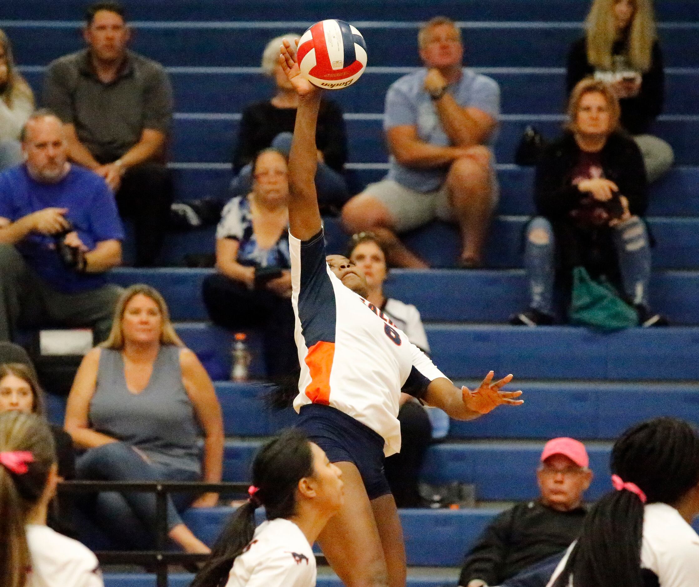 Sachse High School outside hitter Alicia Hearn (8) makes a hit during game two as Sachse...