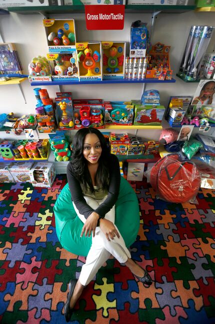 Jamilah Rahim poses for a portrait in her Chicago store that specializes in toys for kids...