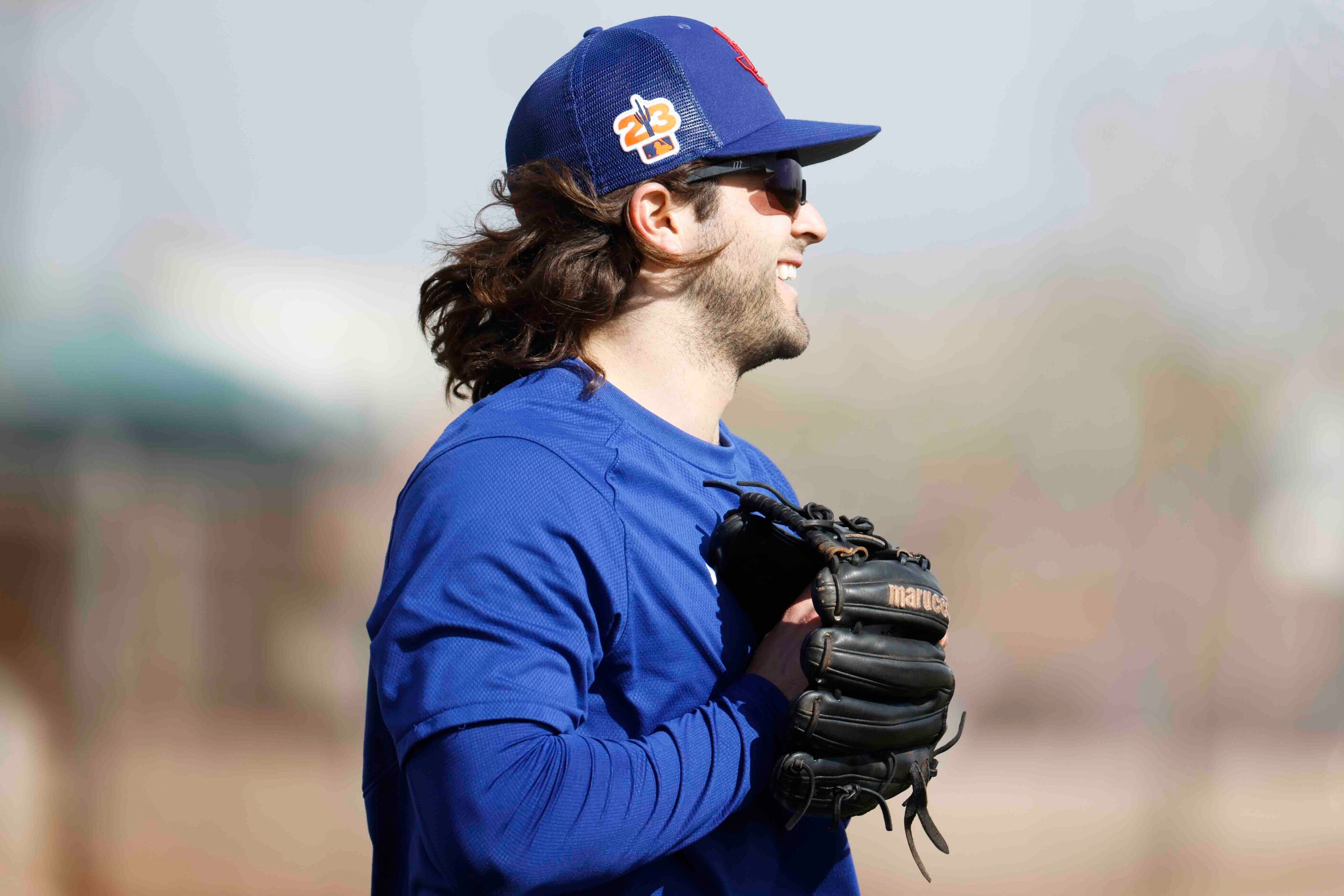 Texas Rangers infielder Josh Smith takes part in a fielding drill during a spring training...