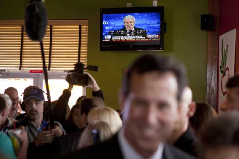 Republican candidate Newt Gingrich was on television in a restaurant Sunday in Tupelo,...
