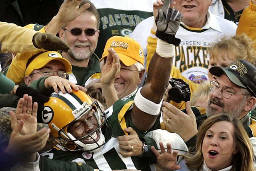  October 24, 2004Â -- Green Bay Packers receiver Donald Driver settles in amongst the fans...