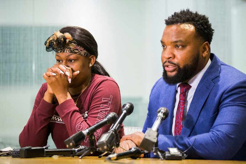 L'Daijohnique Lee appeared with her lawyer, Lee Merritt, during a news conference March 25.