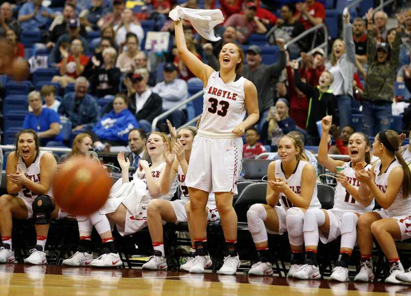 FILE - Argyle's Gabby Standifer (33) cheers as her team scores against Wharton in a 71-31...