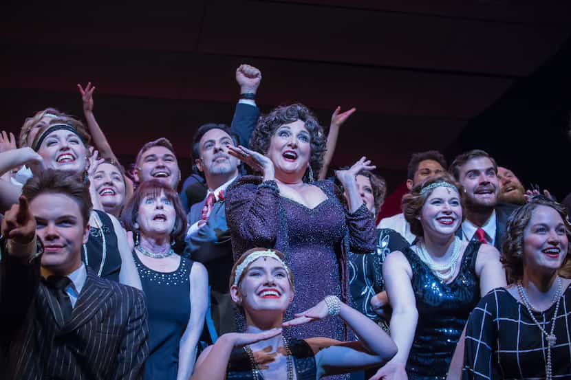 Julie Johnson (center) plays Mame in Lyric Stage's production of  Mame.  Johnson's  voice...