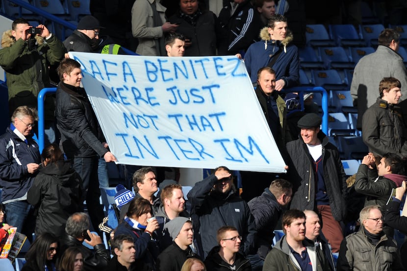 Chelsea fans hold a banner to show their discontent with Interim manager Raphael Benitez...