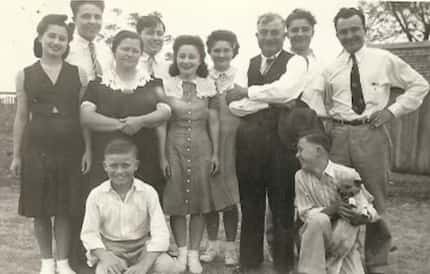 This family photo of the Mikeska family, taken in the 1930s, shows the six boys and three...