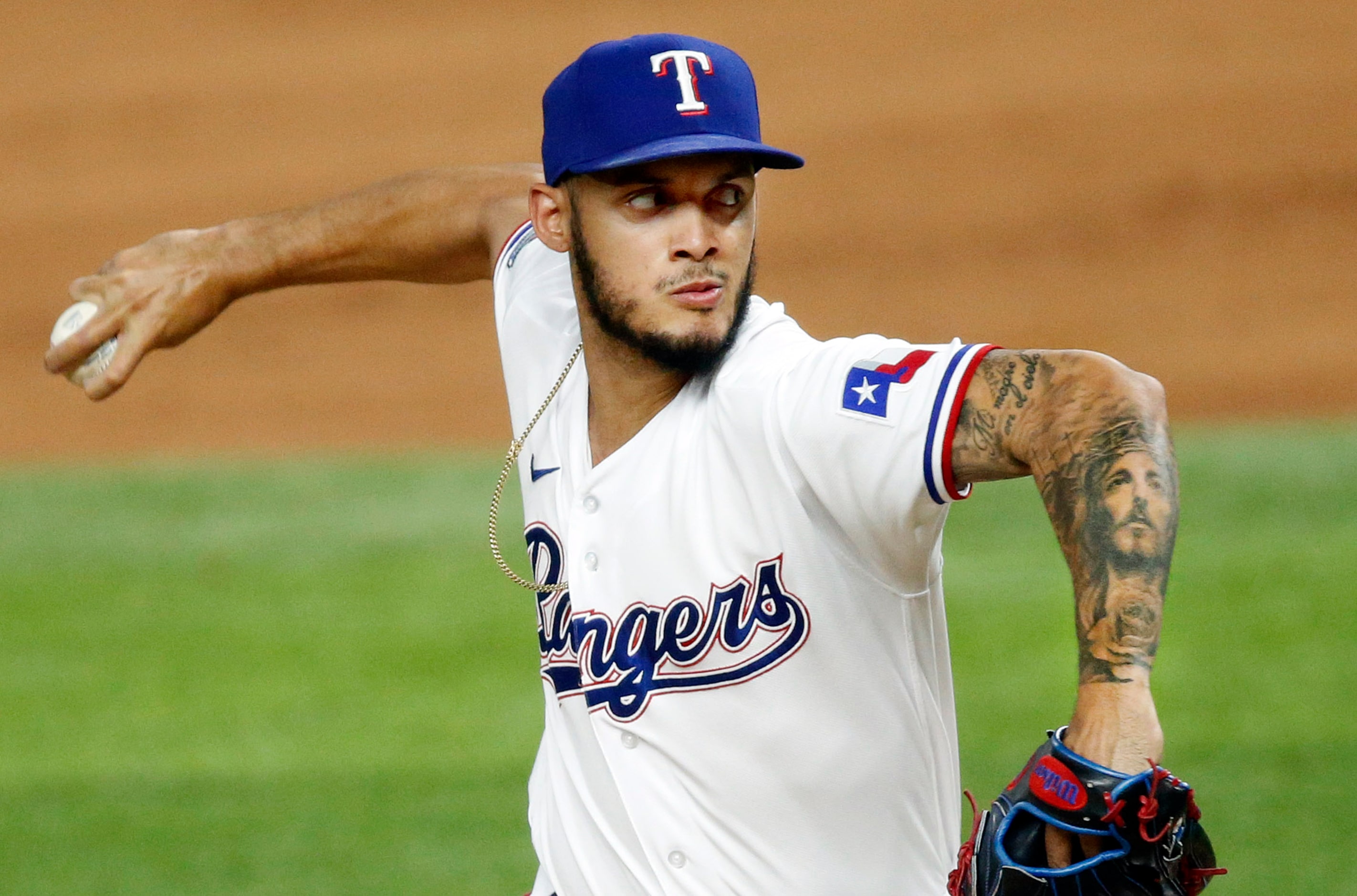 Texas Rangers relief pitcher Jonathan Hernandez (72) throws during the eighth inning against...