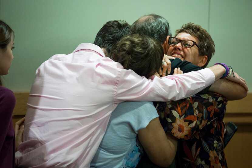 Christina Morris' mother, Jonni McElroy, hugged family members after Wednesday's guilty...