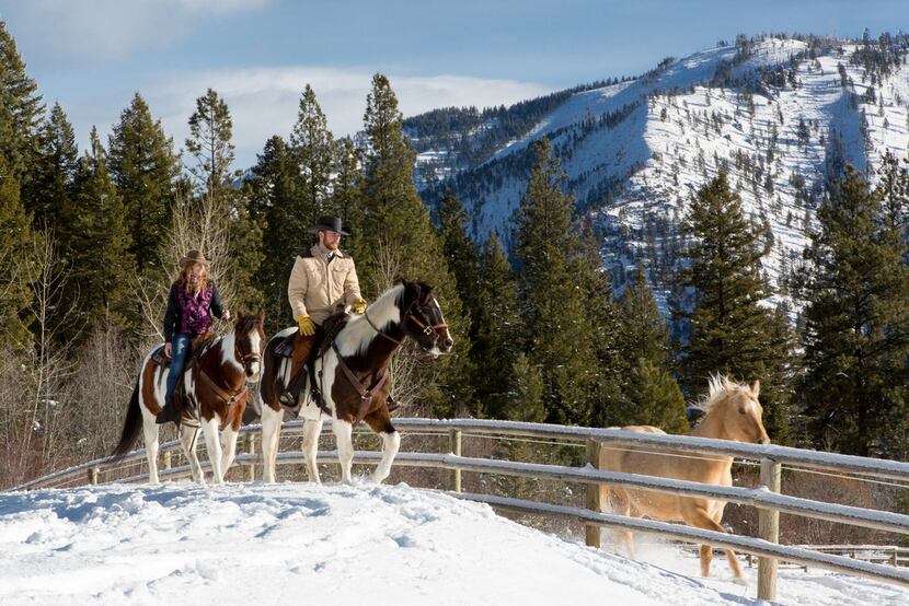 Hitting the trail on horseback is a great way to see the winter scenery at Montana's Triple...