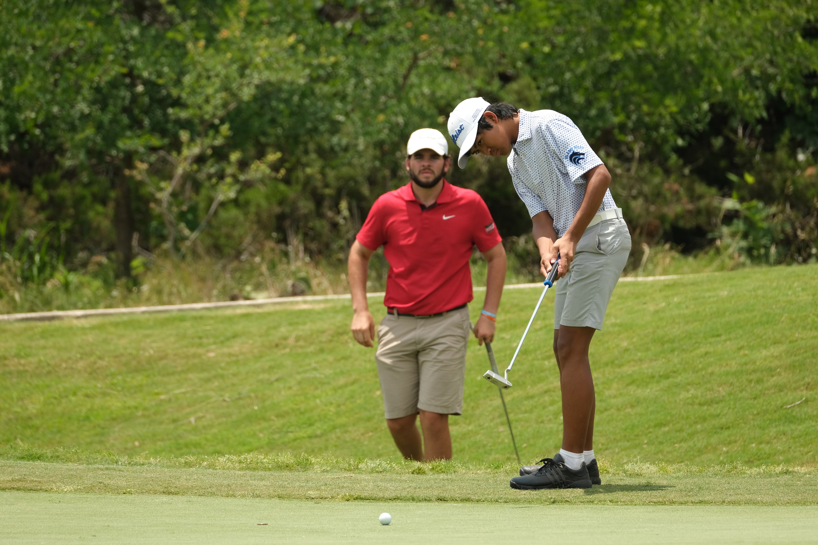 Khai Reyes of Plano West putts during Day 2 of the UIL 6A boys golf state tournament on May...