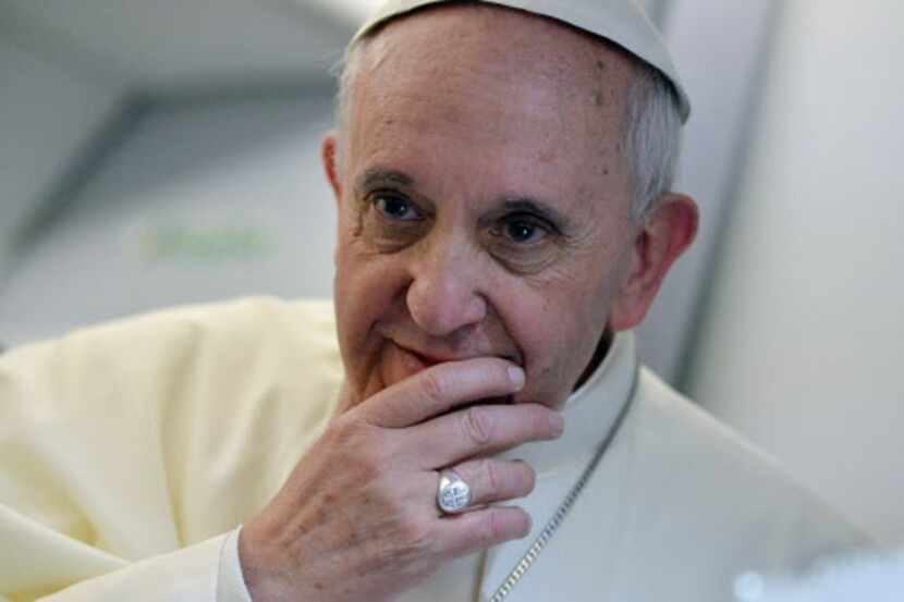  Pope Francis during a news conference aboard his airplane en route to Italy after a visit...