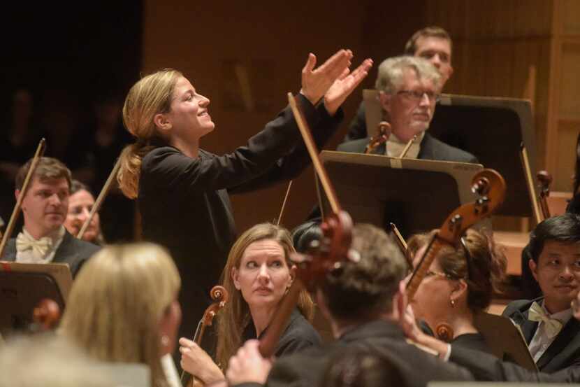 Karina Canellakis acknowledges the soloists that played during Dallas  performance of...