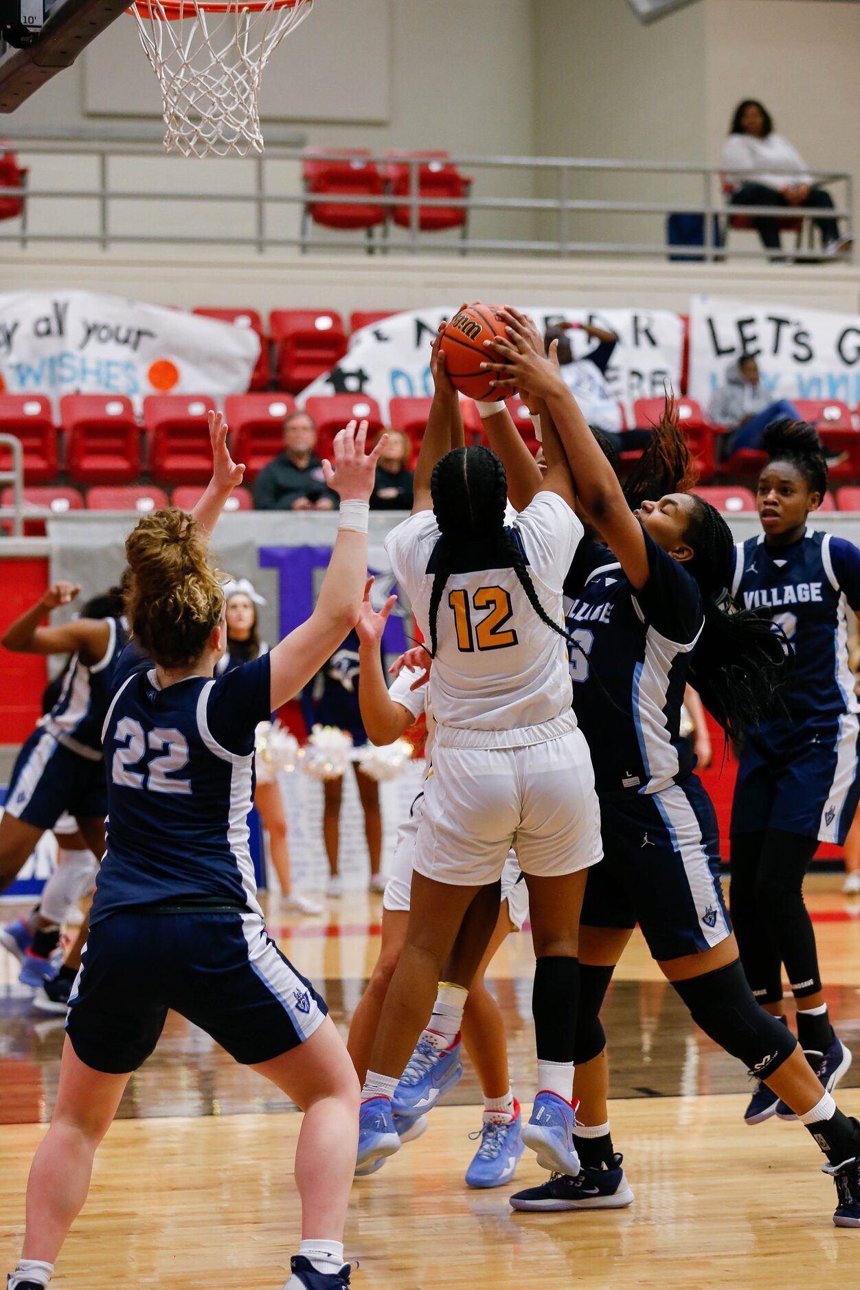 Players from Plano Prestonwood Christian and the Village School fight for the ball during...