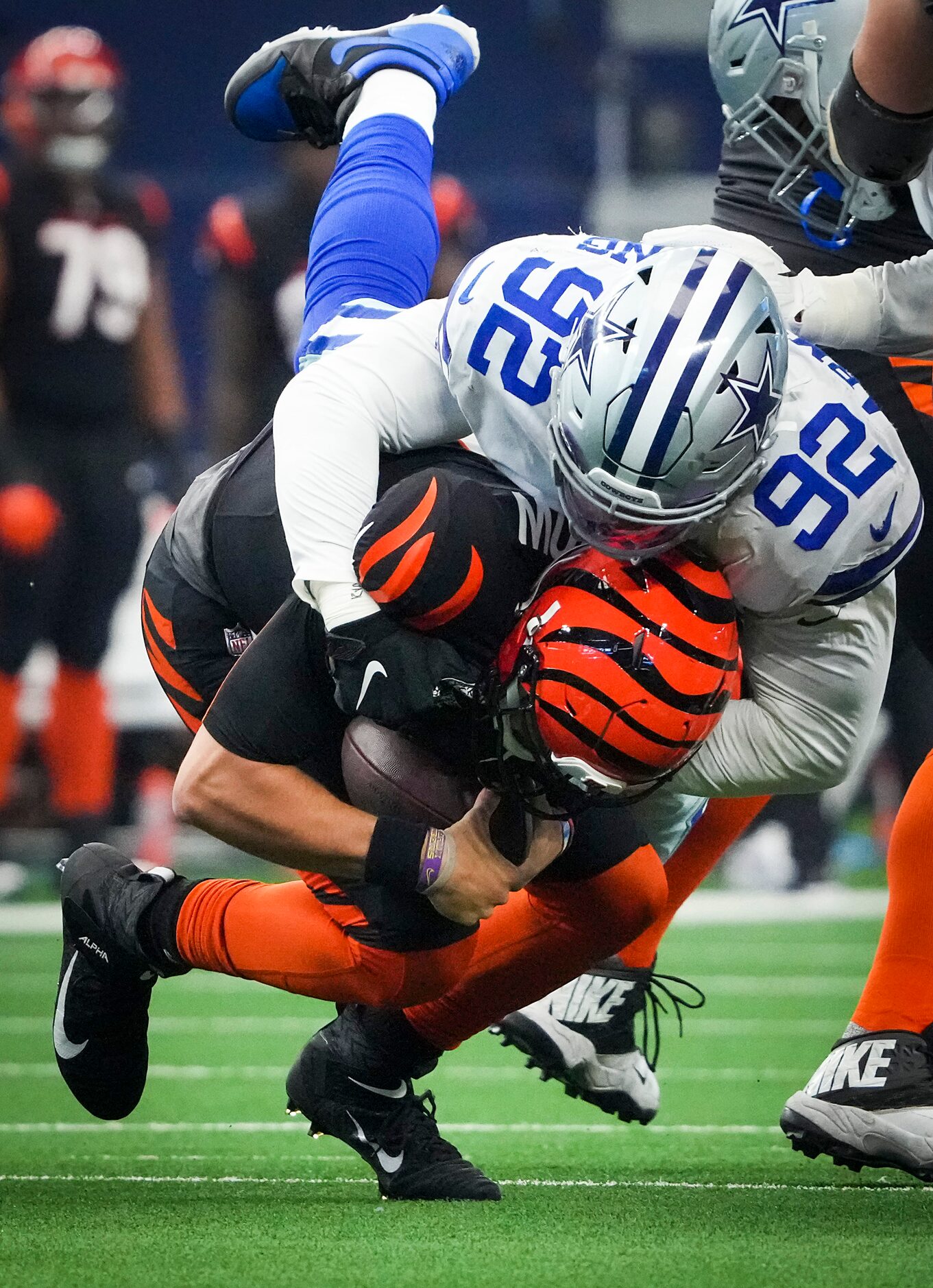 Dallas Cowboys defensive end Dorance Armstrong (92) sacks Cincinnati Bengals quarterback Joe...