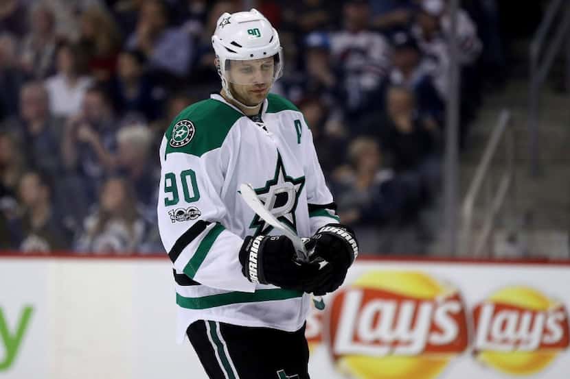 Dallas Stars centre Jason Spezza (90) looks on during second period NHL hockey action...