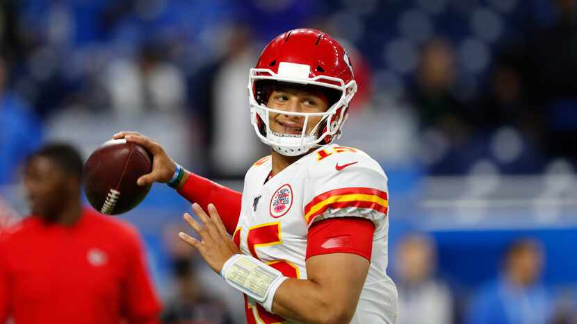 Kansas City Chiefs quarterback Patrick Mahomes throws before an NFL football game against...