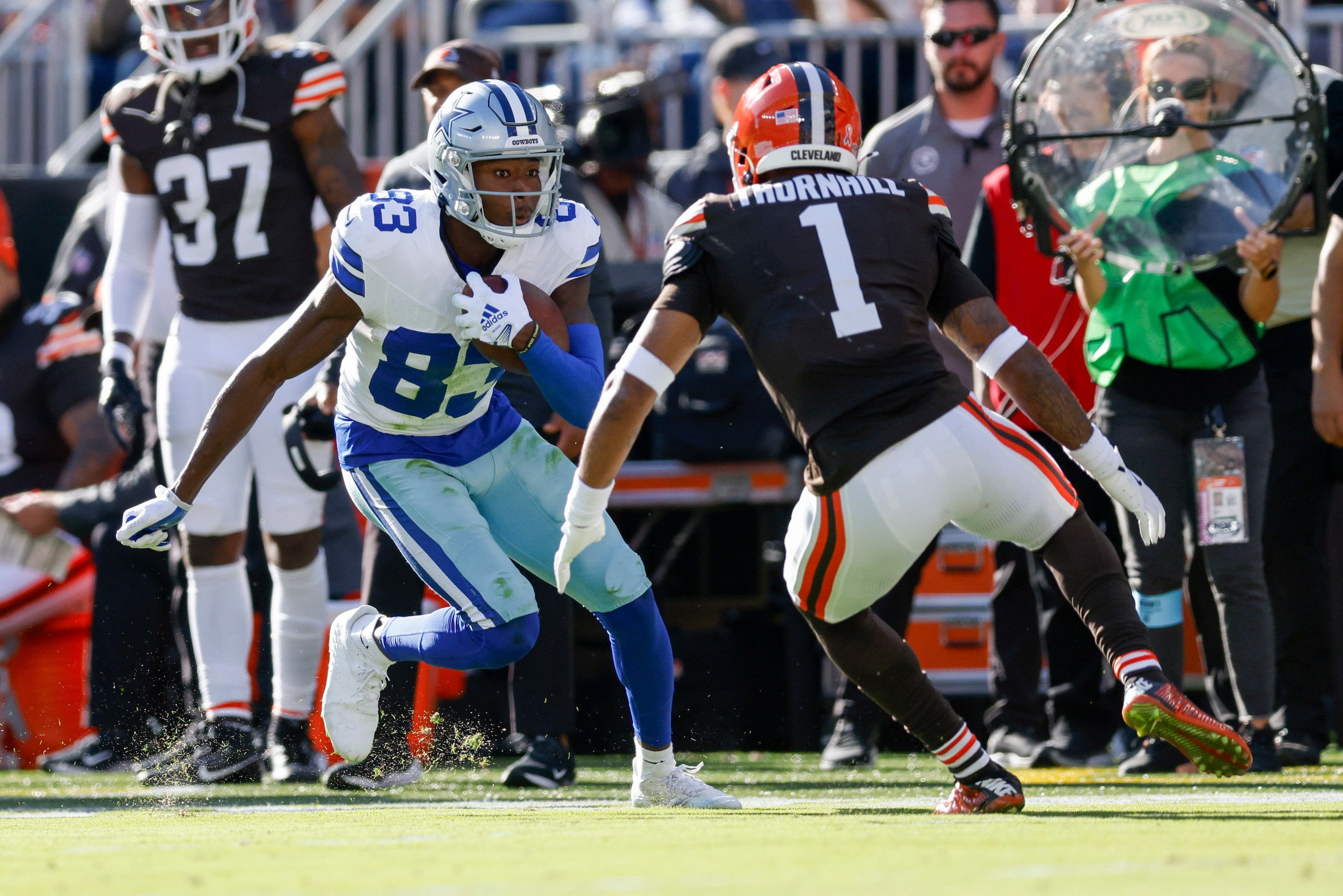 Dallas Cowboys wide receiver Jalen Brooks (83) runs after a catch against Cleveland Browns...