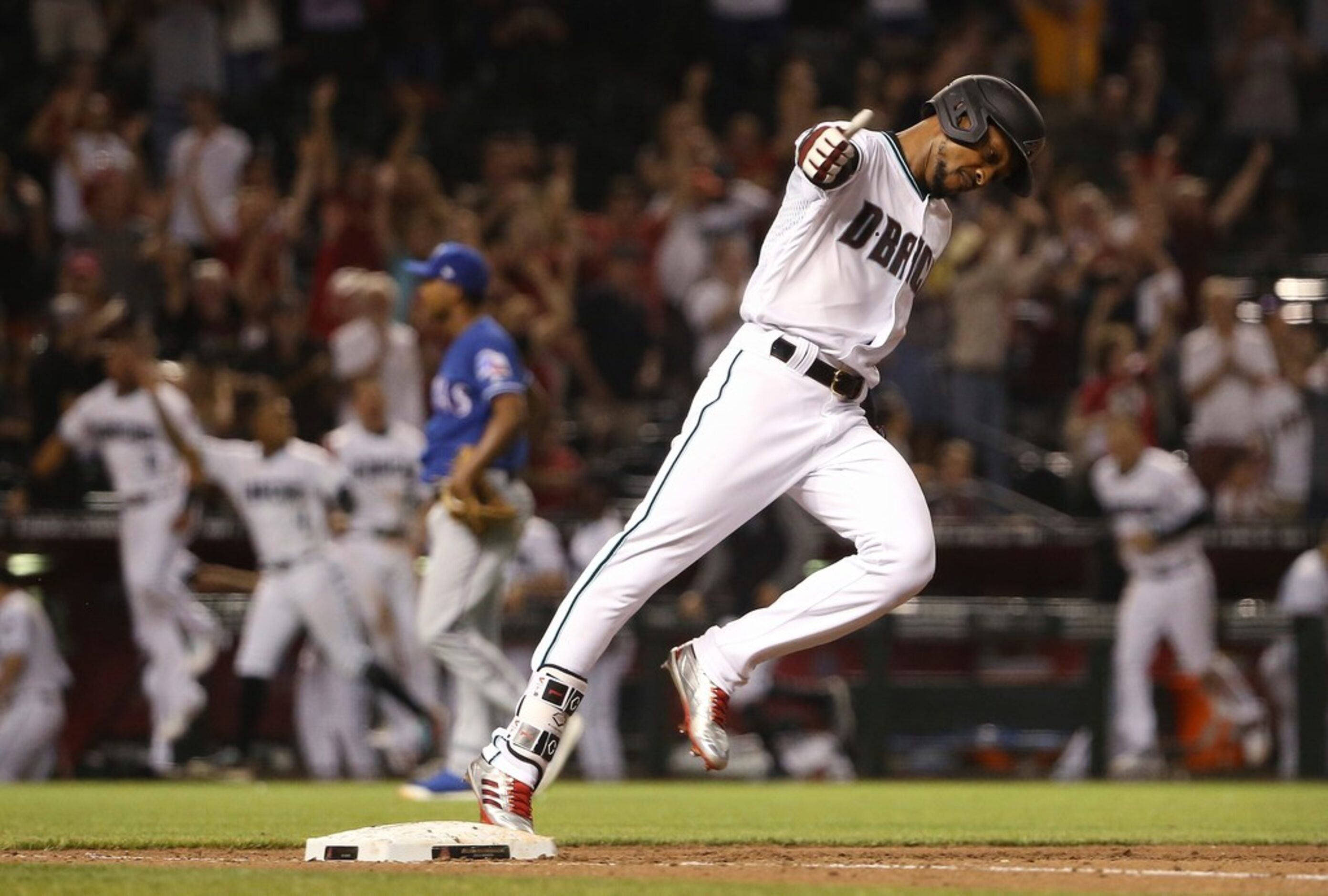 Arizona Diamondbacks' Jarrod Dyson celebrates his two-run walk-off home run against the...