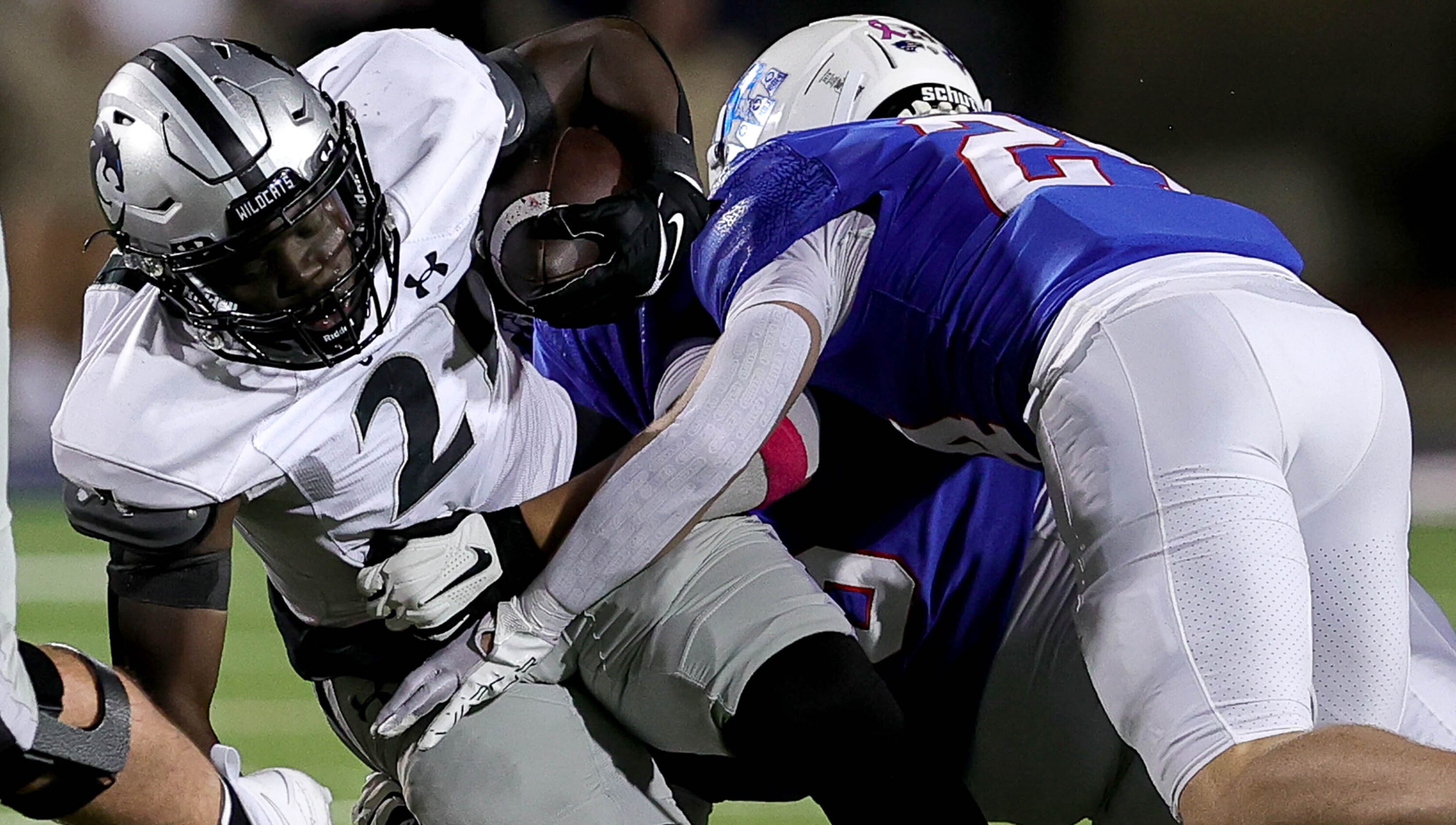 Denton Guyer running back Ahmed Yussuf (21) gets stuffed by Allen defensive lineman Devin...