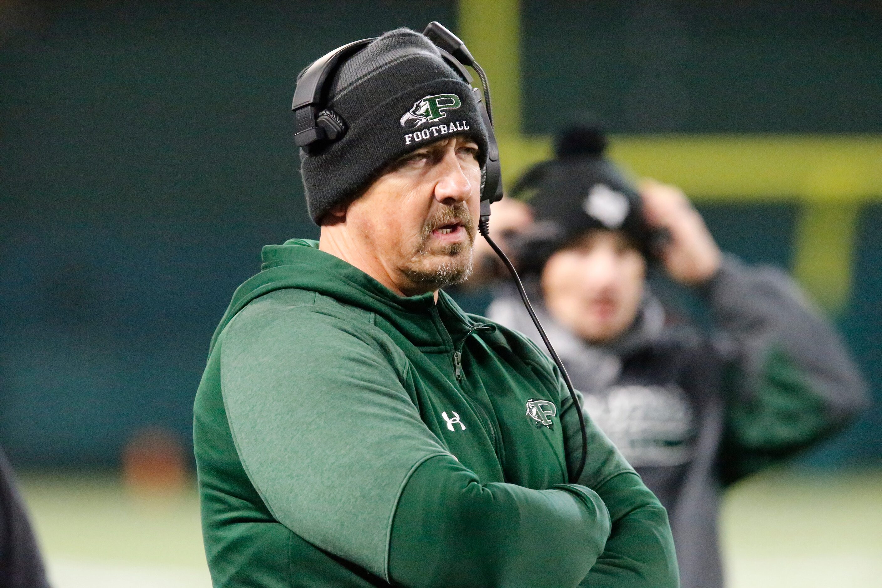 Prosper High School head coach Brandon Schmidt looks on during the first half as Prosper...