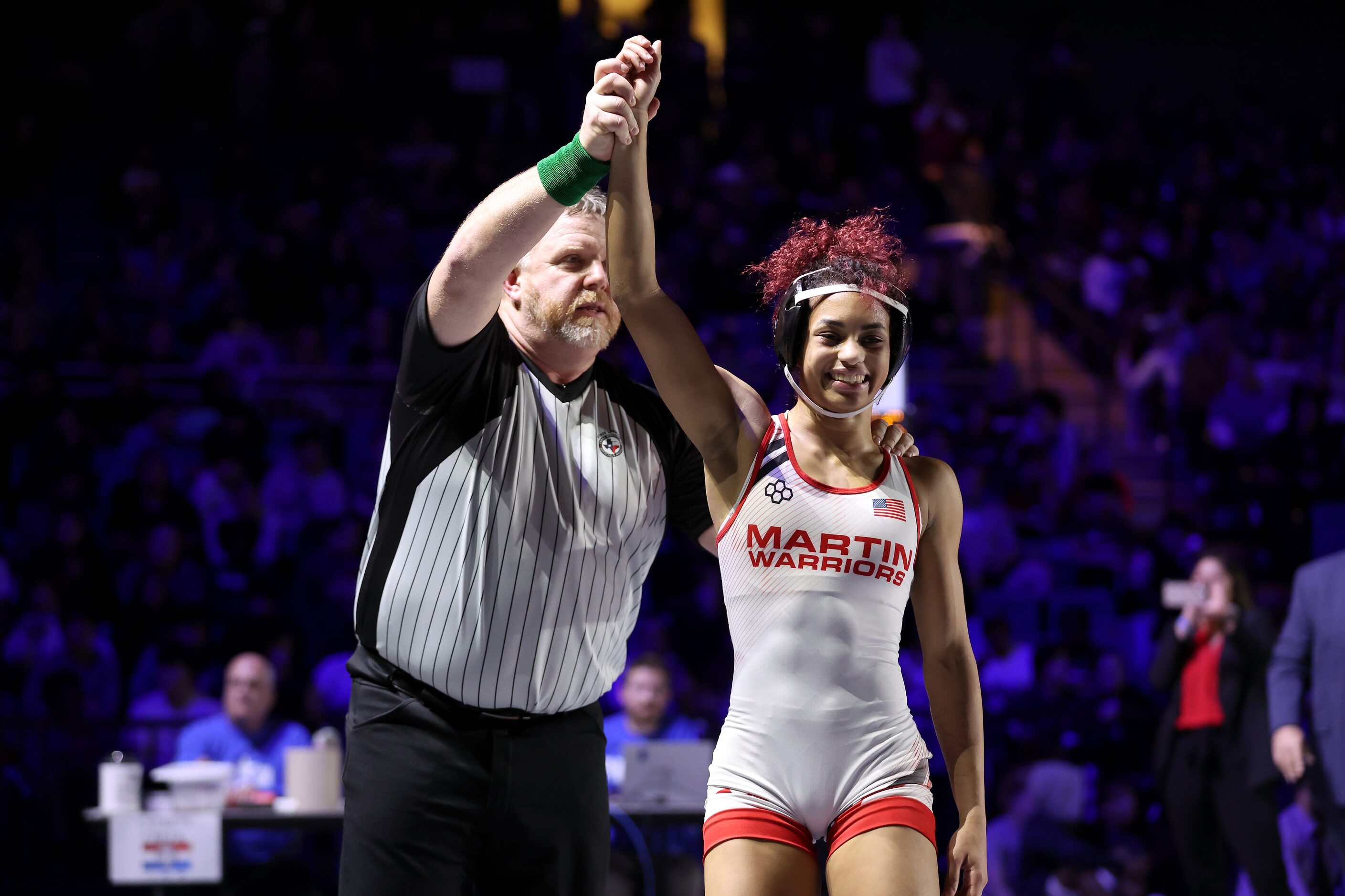 Jania Dunigan of Arlington Martin (white) defeats Sarah Conner of Richardson Lake Highlands...