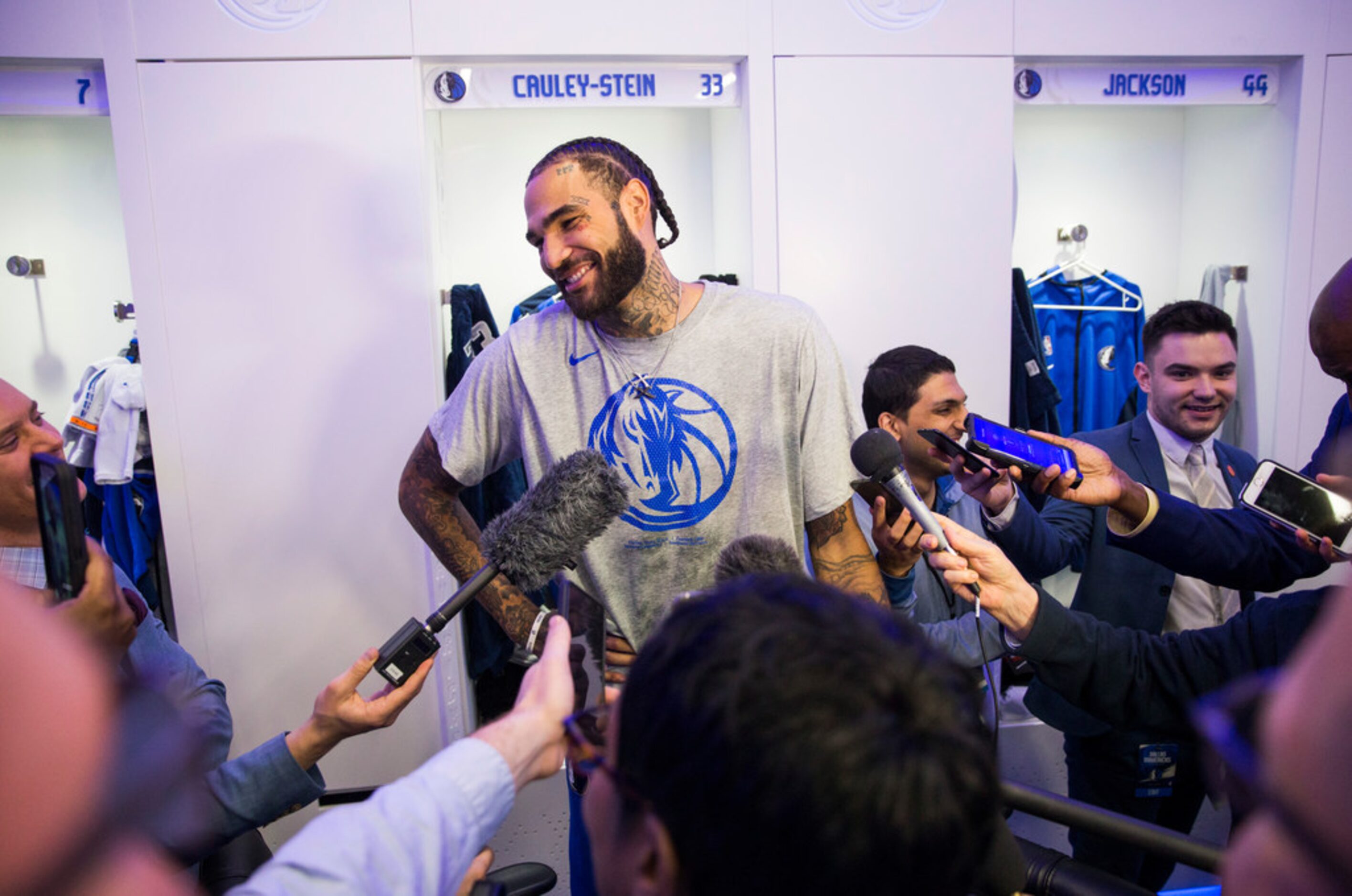 Dallas Mavericks center Willie Cauley-Stein (33) speaks to reporters in the locker room...