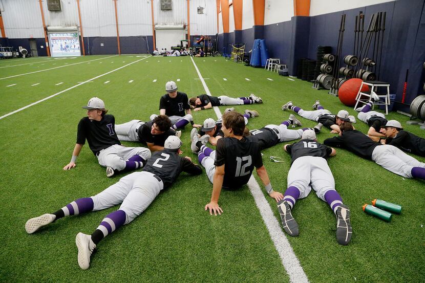 The Frisco Independence baseball team waits in the Frisco Wakeland fieldhouse as their game...