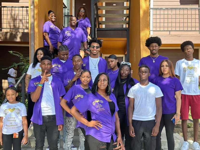 Family members of Trey'Shawn Eunes wore purple jerseys to his funeral service, in the spirit...