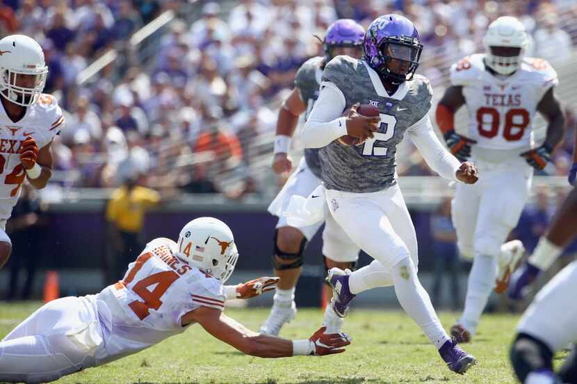 FORT WORTH, TX - OCTOBER 03:  Trevone Boykin #2 of the TCU Horned Frogs carries the ball...