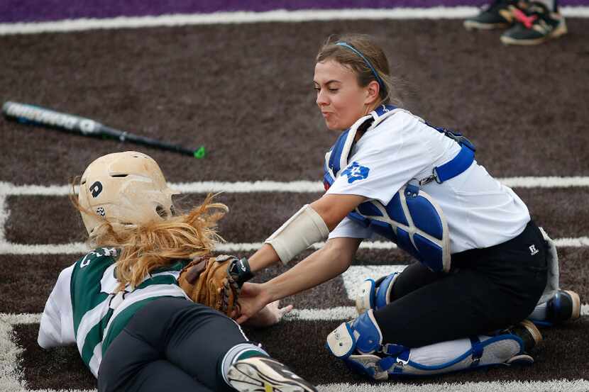 Dallas Christian's Kennedy Barnett (3) gets the tag out on Fort Bend Christian Academy's...