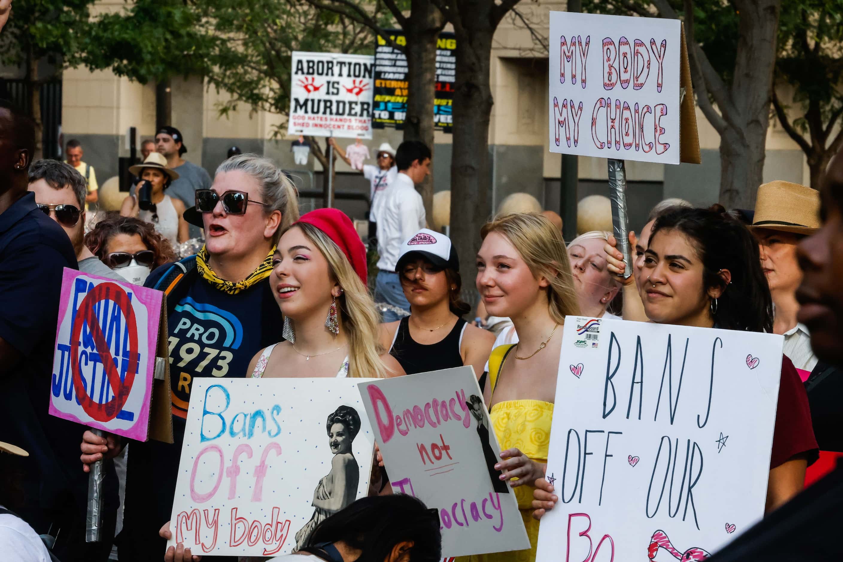 A group of demonstrators gather at the Civic Garden in downtown Dallas on Friday, June 24,...