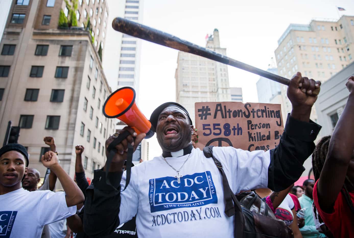 Ernest Walker and other protesters marched through downtown Dallas before a gunman opened...