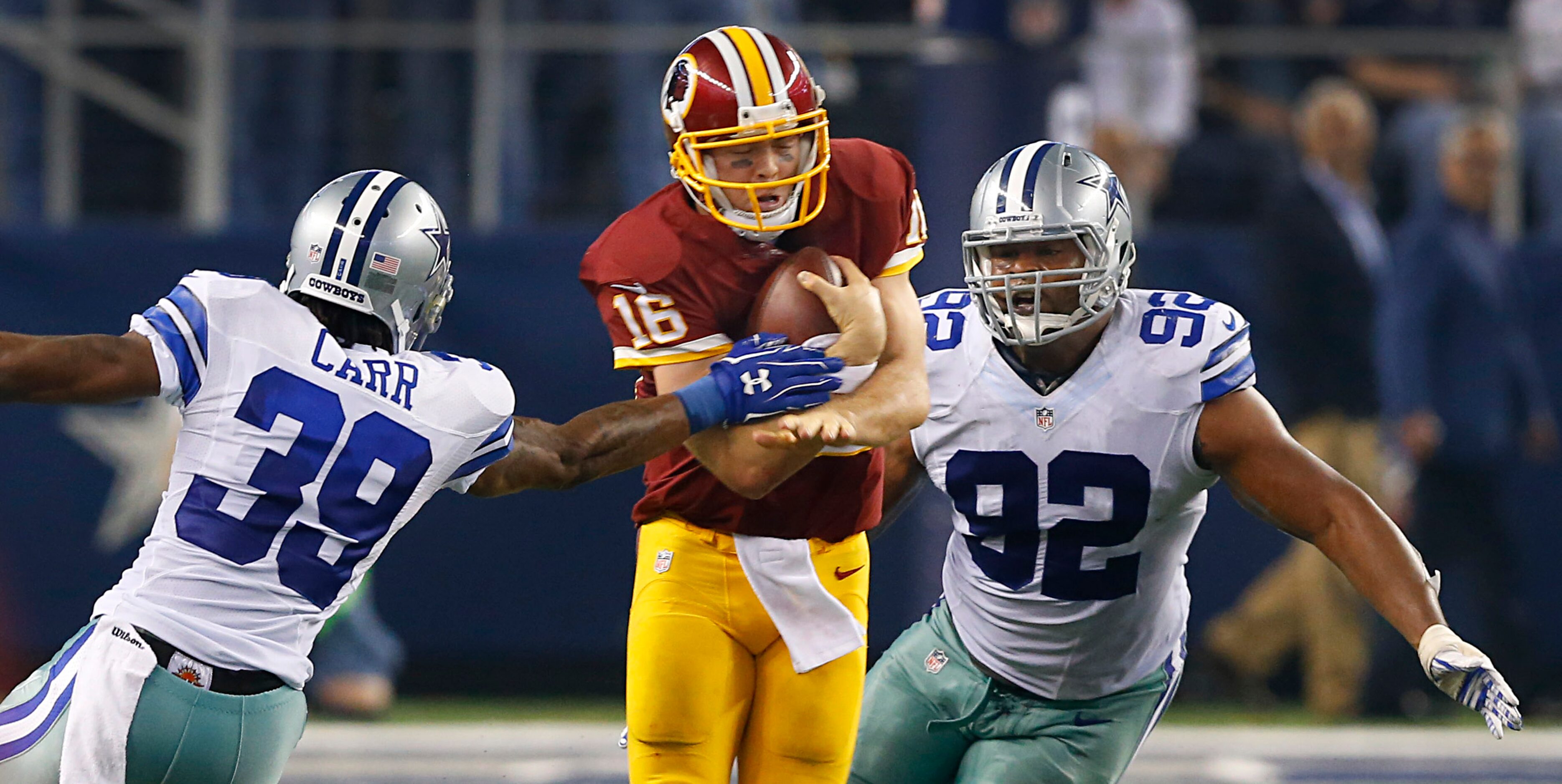 \39\ and Dallas Cowboys defensive end Jeremy Mincey (92) chase down Washington Redskins...