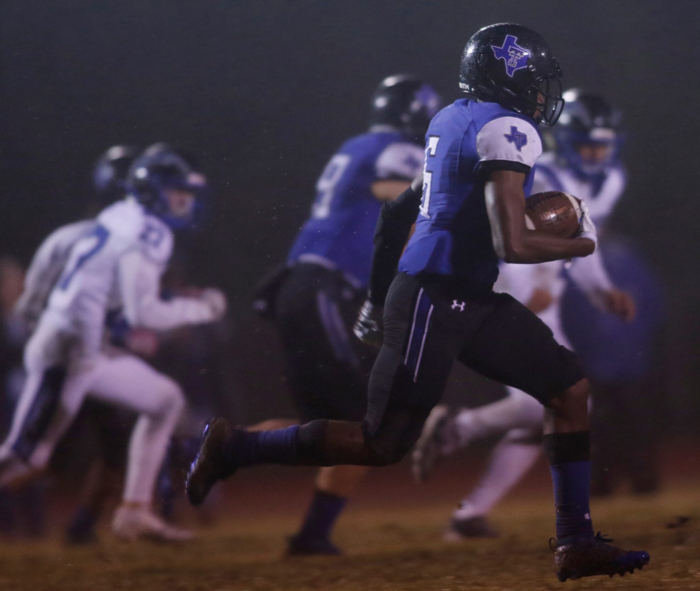 Trinity Christian-Cedar Hill receiver Cameron Wilson (6) returns a kickoff during first half...