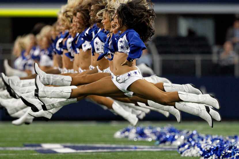 The Dallas Cowboys Cheerleaders perform during their NFL football game against the...