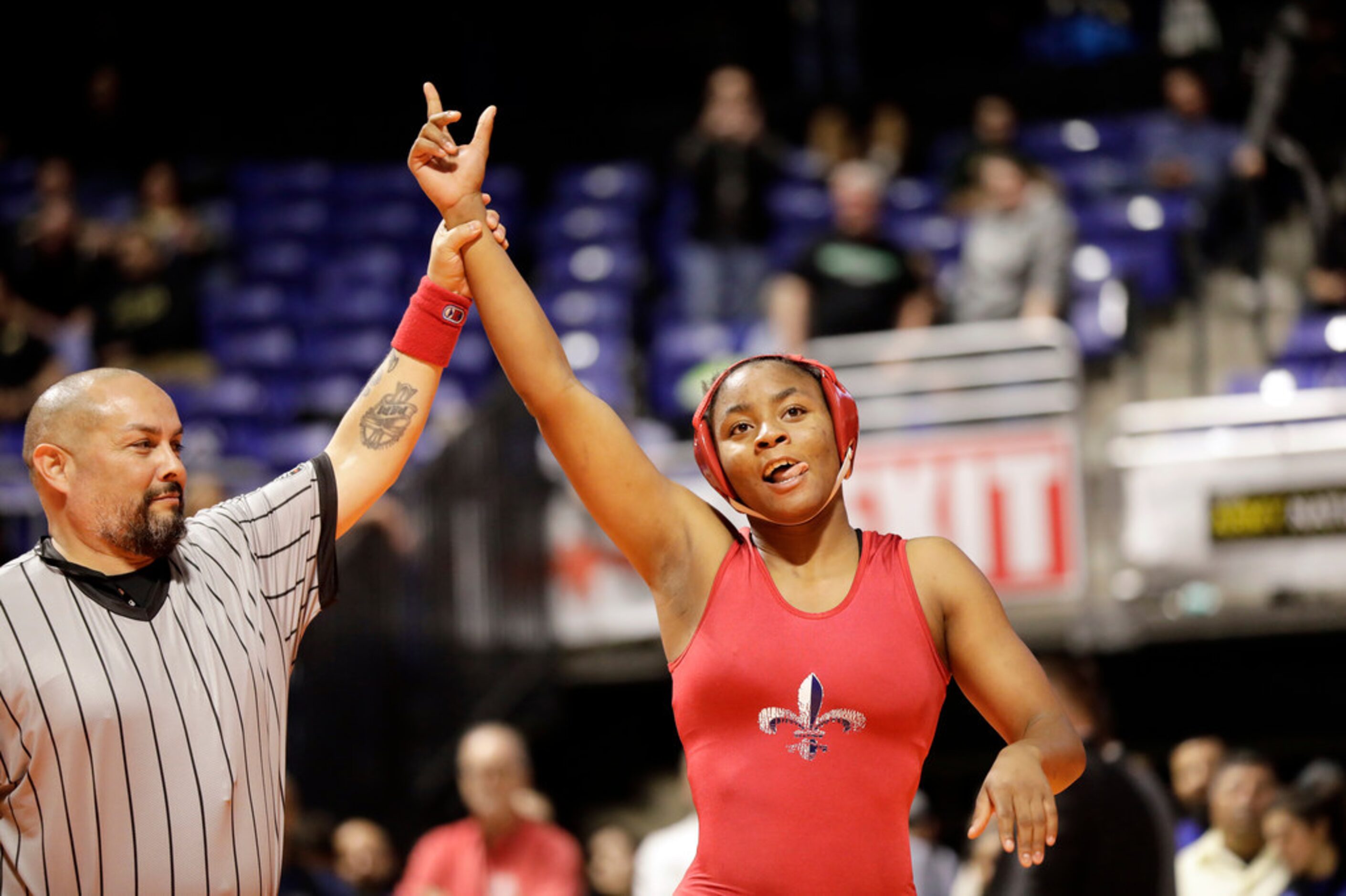 Destiny Miles of Dallas Kimball wrestles during the UIL Texas State Wrestling Championships,...