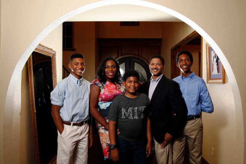The Waters family, William, 16, Frances, Christopher, 11, James, and Joshua, 15, pose for a...