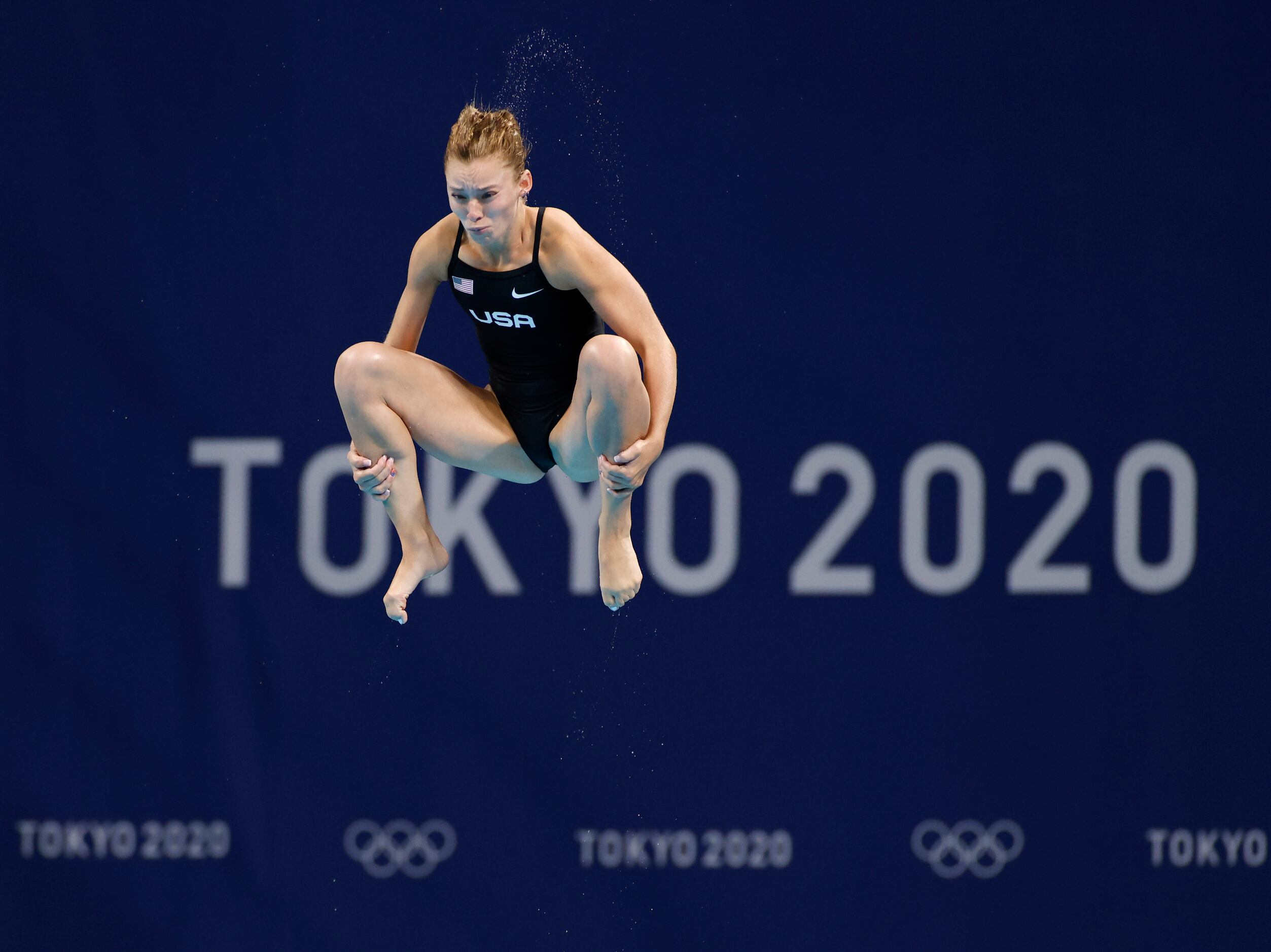 USA’s Hailey Hernandez dives in round 2 of 5 in the women’s 3 meter springboard semifinal...