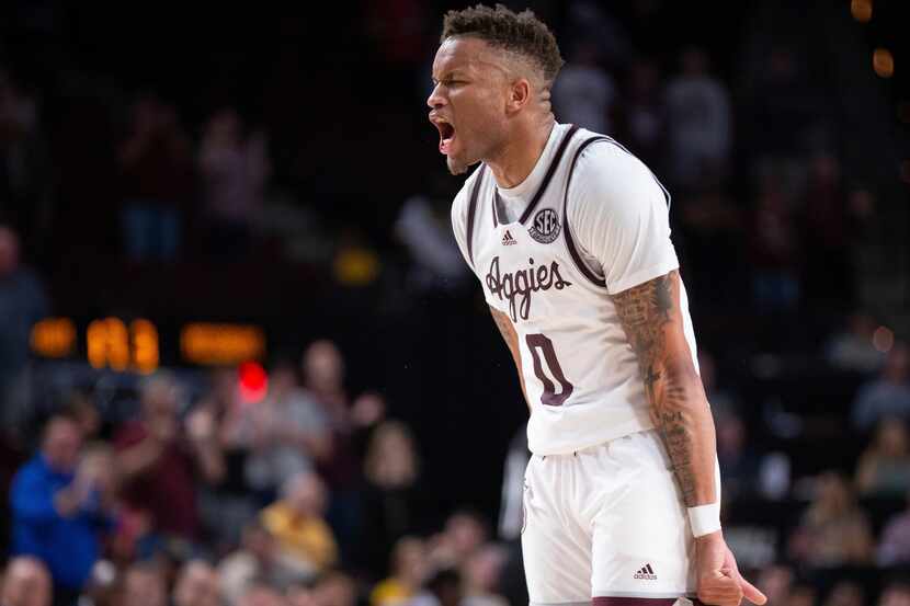 Texas A&M Aggies guard Dexter Dennis (0) celebrates after an NCAA college basketball game...