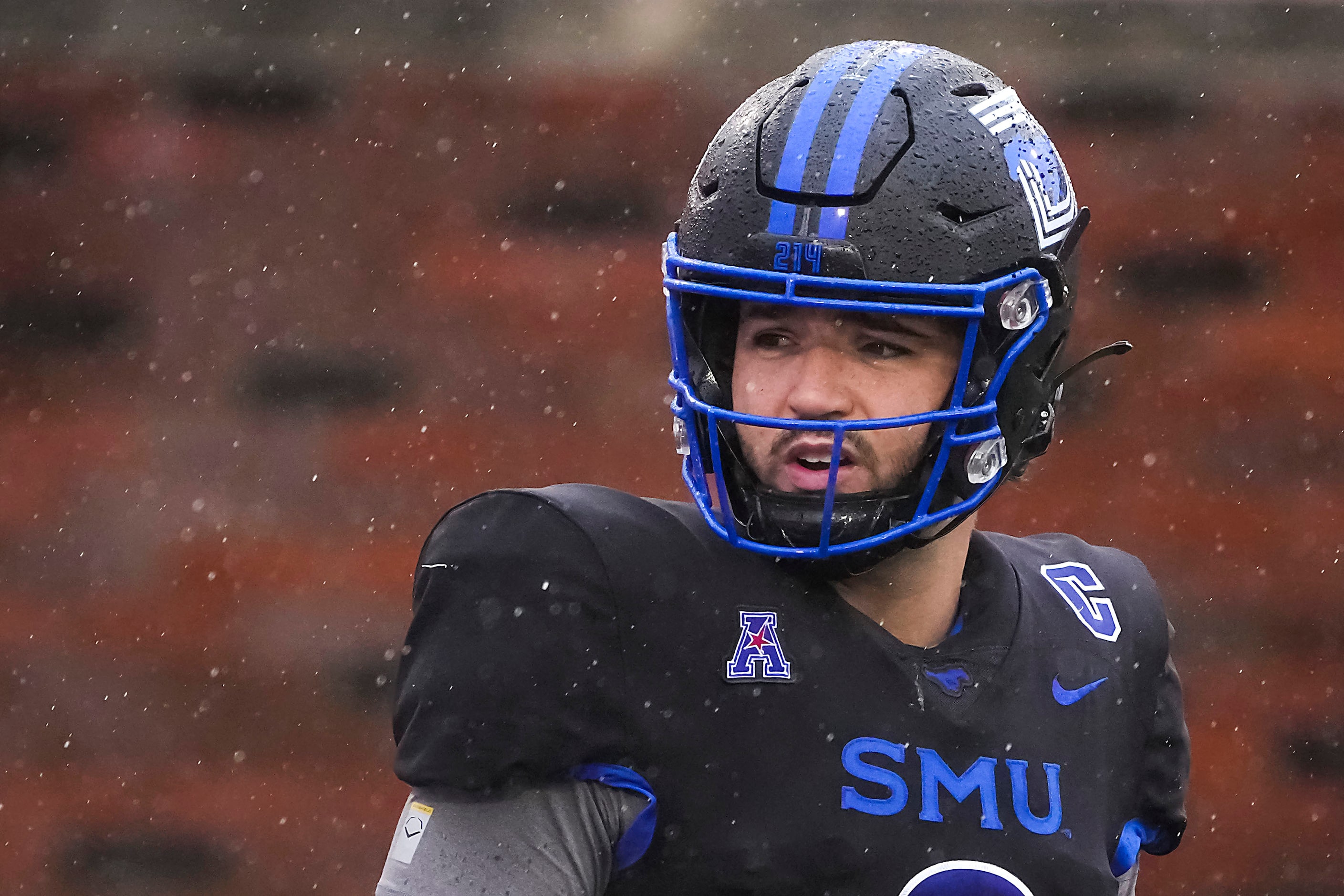 SMU quarterback Tanner Mordecai looks back to the sidelines during the first half of an NCAA...