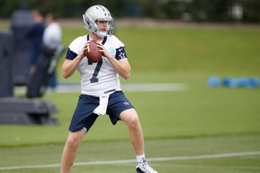 Dallas Cowboys quarterback Cooper Rush (7) runs through a drill during rookie minicamp at...