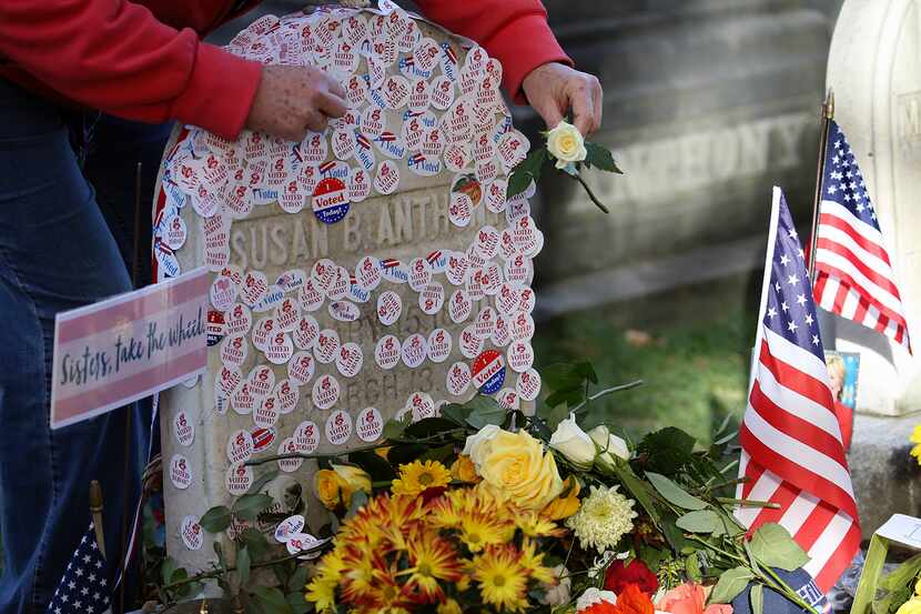 Voters lined up on Election Day to place "I voted" stickers on the grave of Susan B. Anthony...